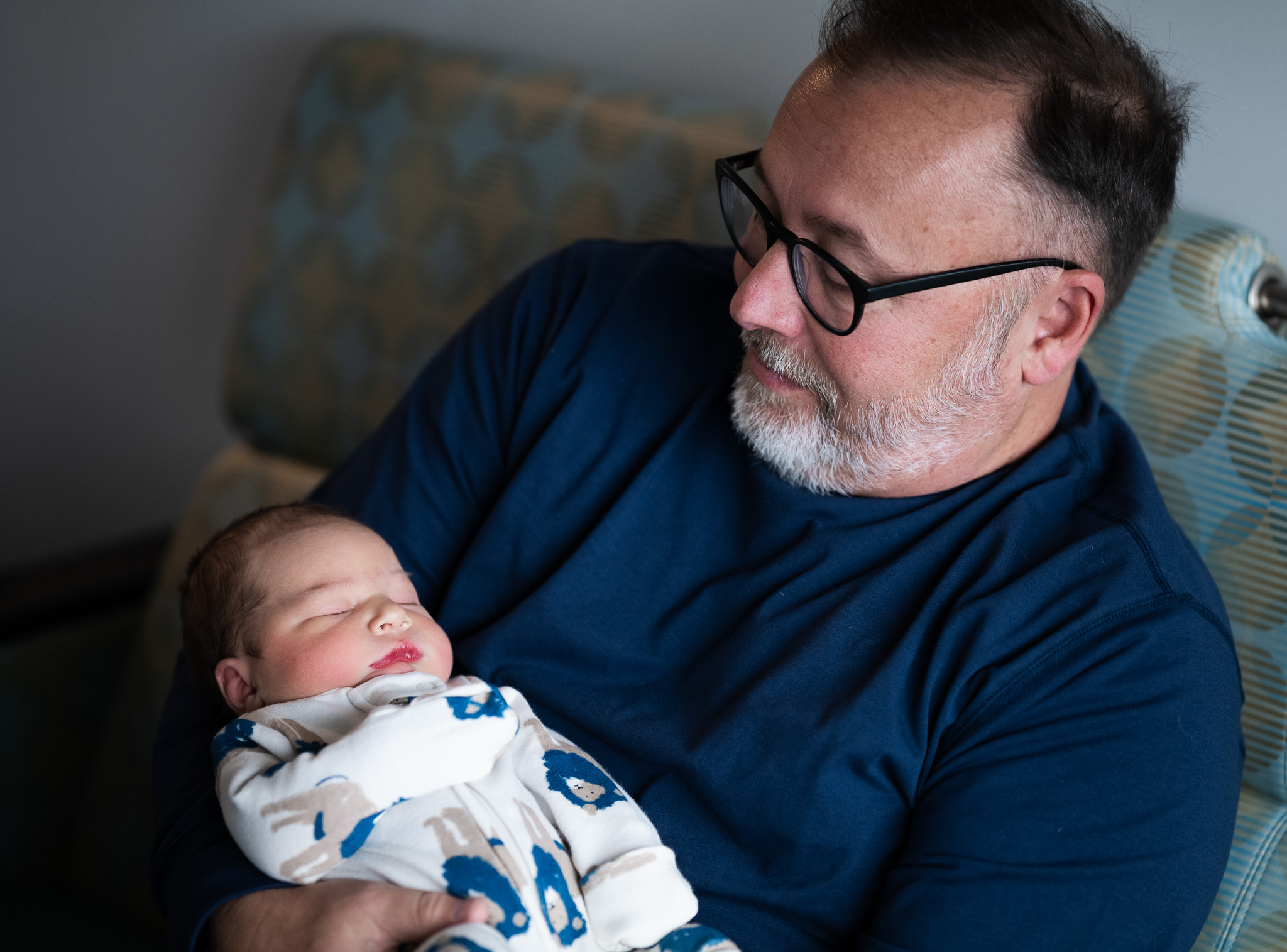 Proud grandpa holding Lincoln