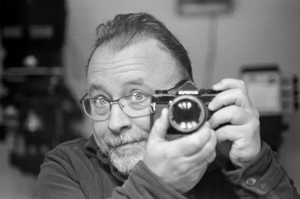 Black and white film self-portrait in mirror