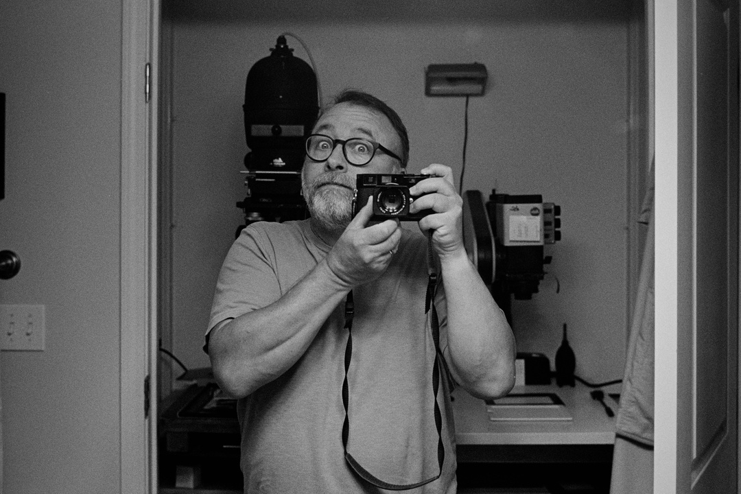 Black and white film self-portait in mirror