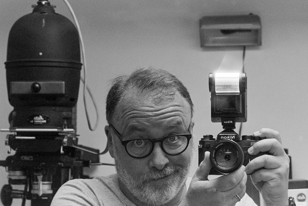 Black and white film self-portrait in mirror