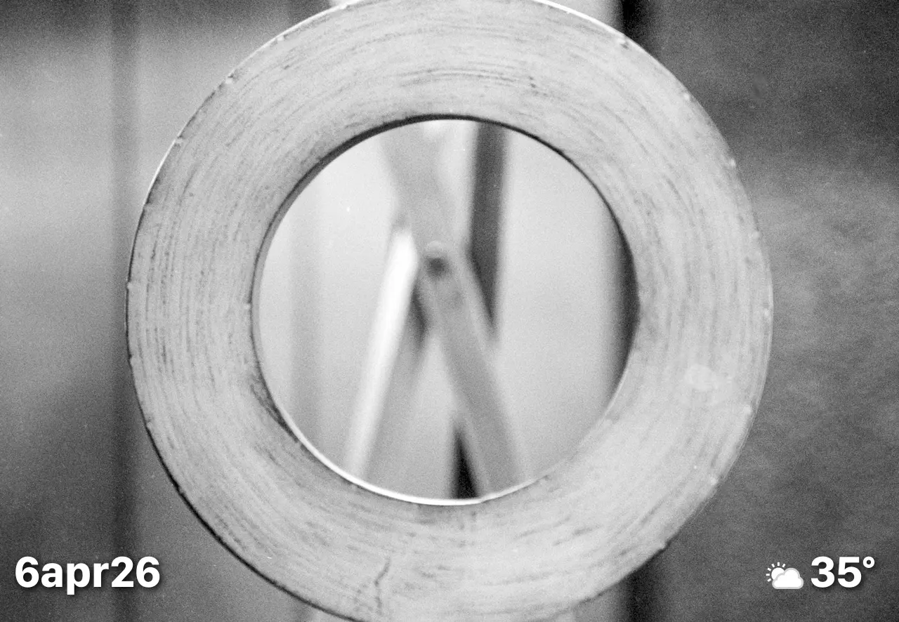 Black and white film photo of abstract sculpture