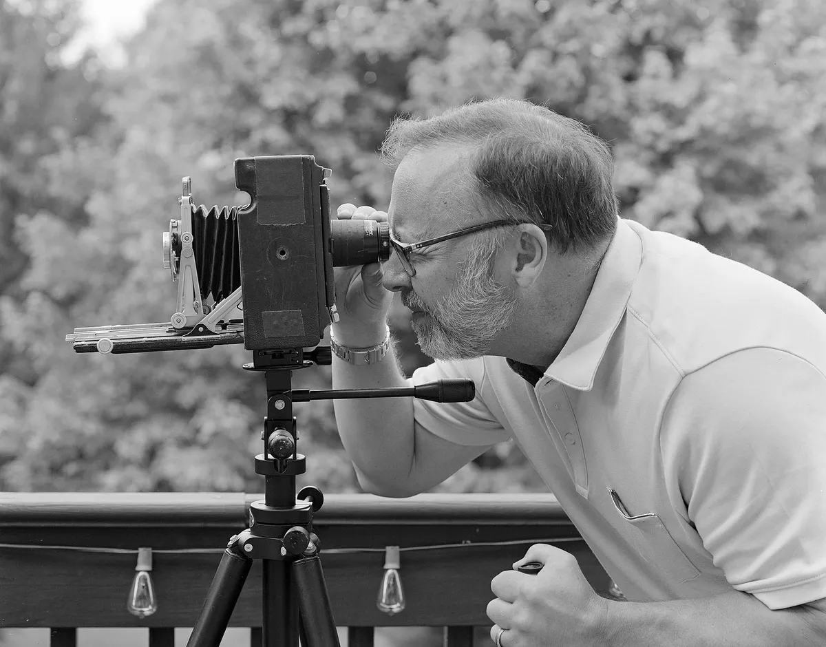 Black and white photo of me pretending to use the Crown Graphic