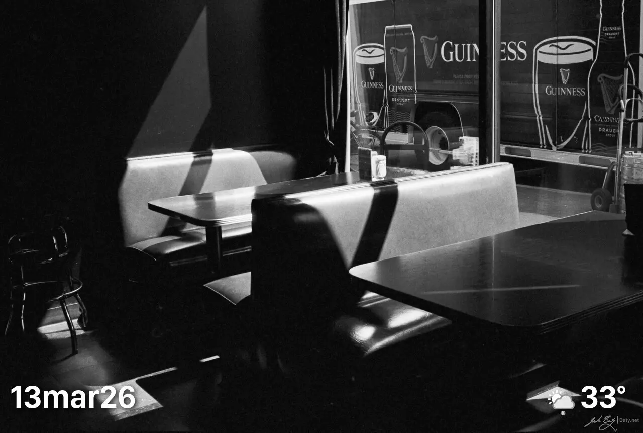 Black and white photo of restaurant interior