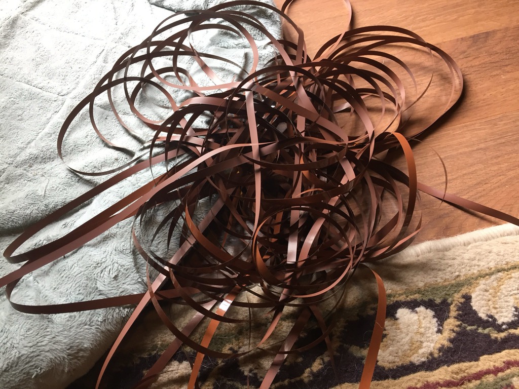 Audio tape unwound on the floor