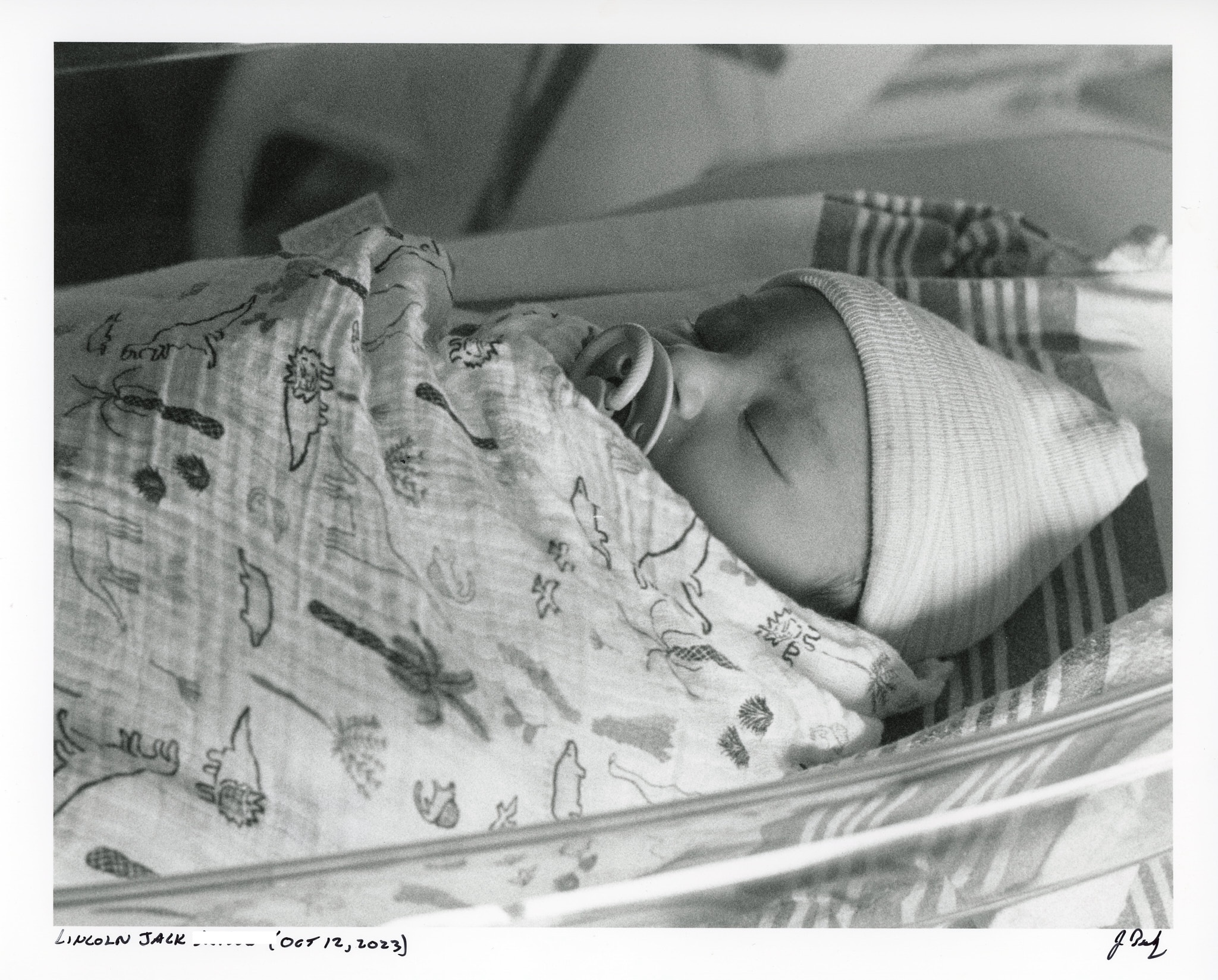 Newborn baby wrapped in blanket