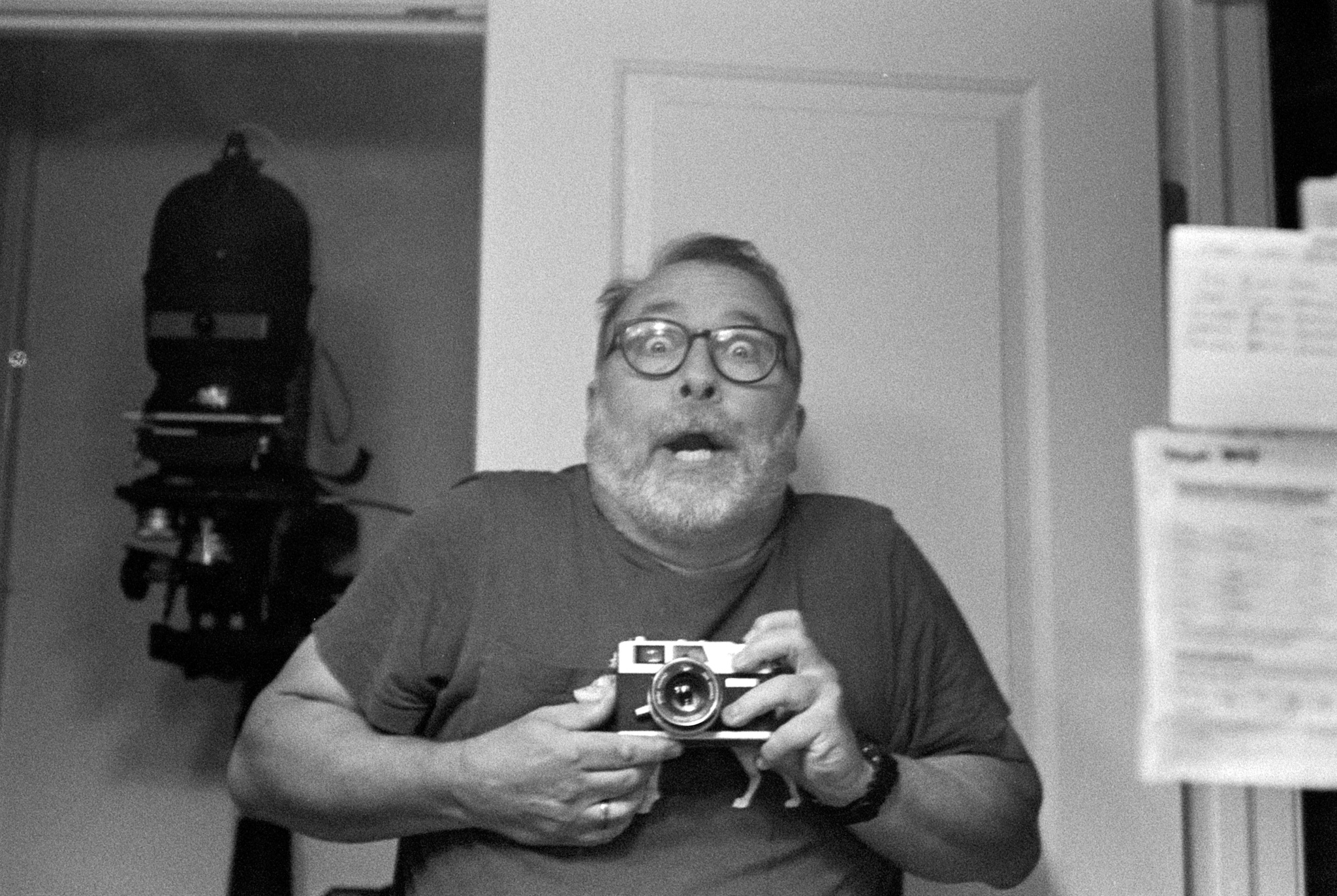 Self-portrait in mirror with Canonet